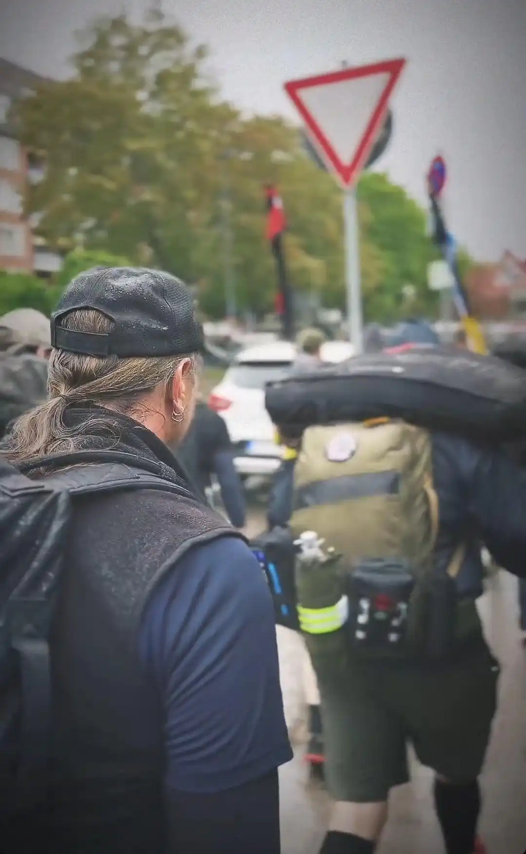 Image: Group movement through the city. View from the back of participants