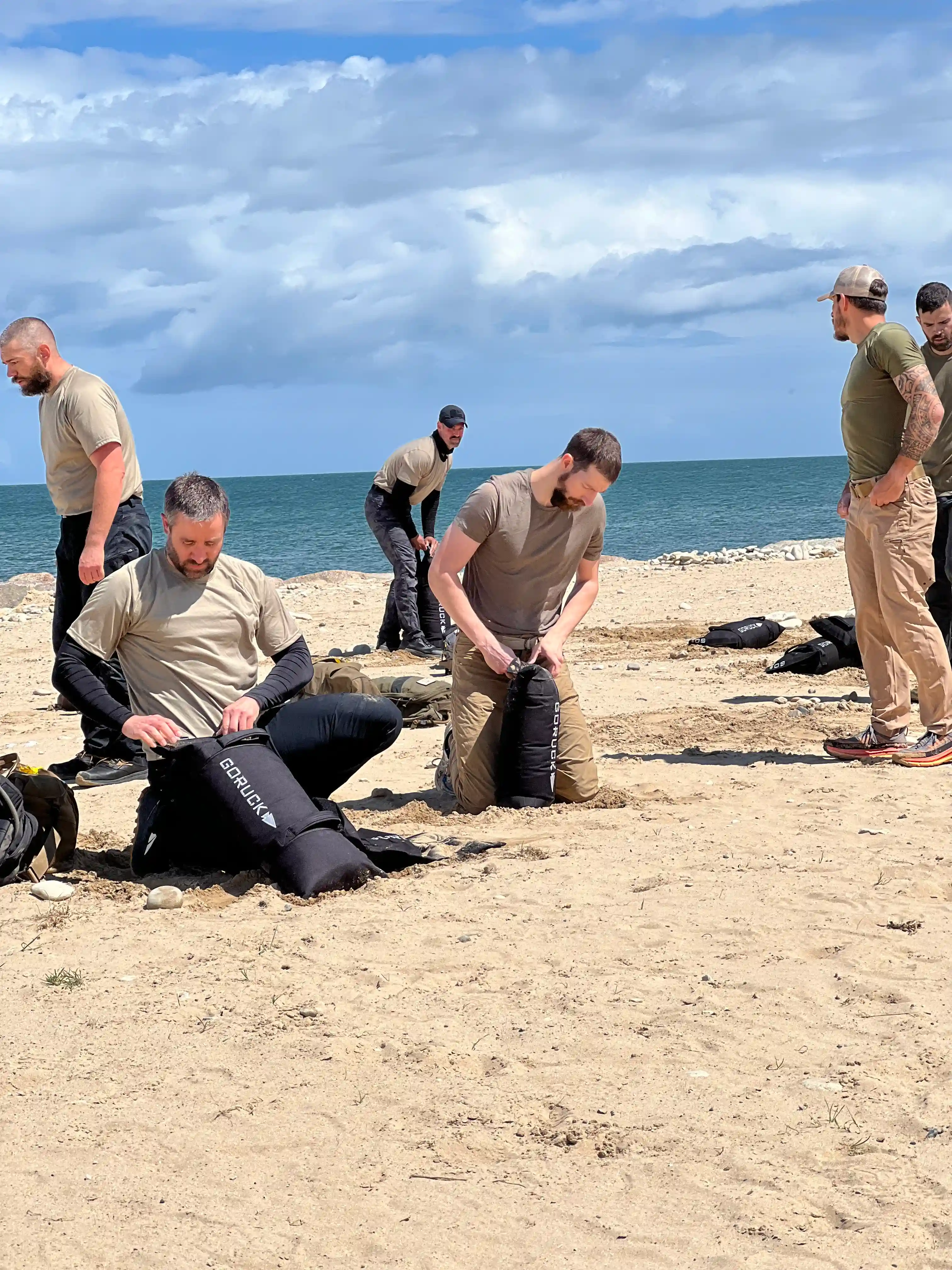 Image: Candidates filling up sandbags